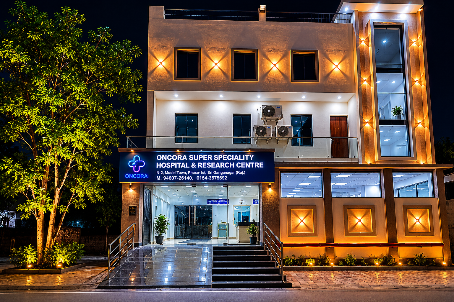 Oncora Superspeciality Hospital building at night
